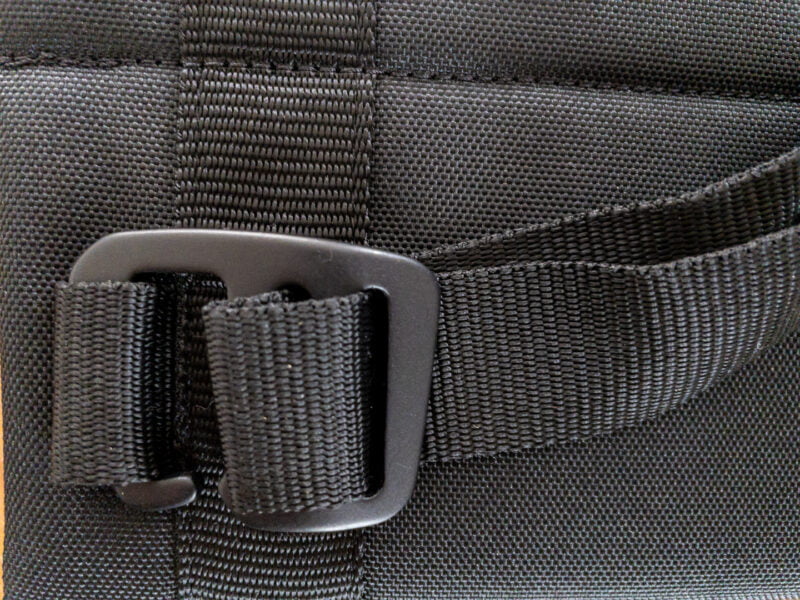 Lens Carrier M open hook for easy attachment to straps.